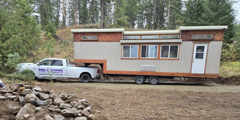 Towing a brown tiny house