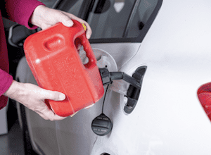 Gasoline Container refueling a Car