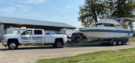 Boat trailer being towed